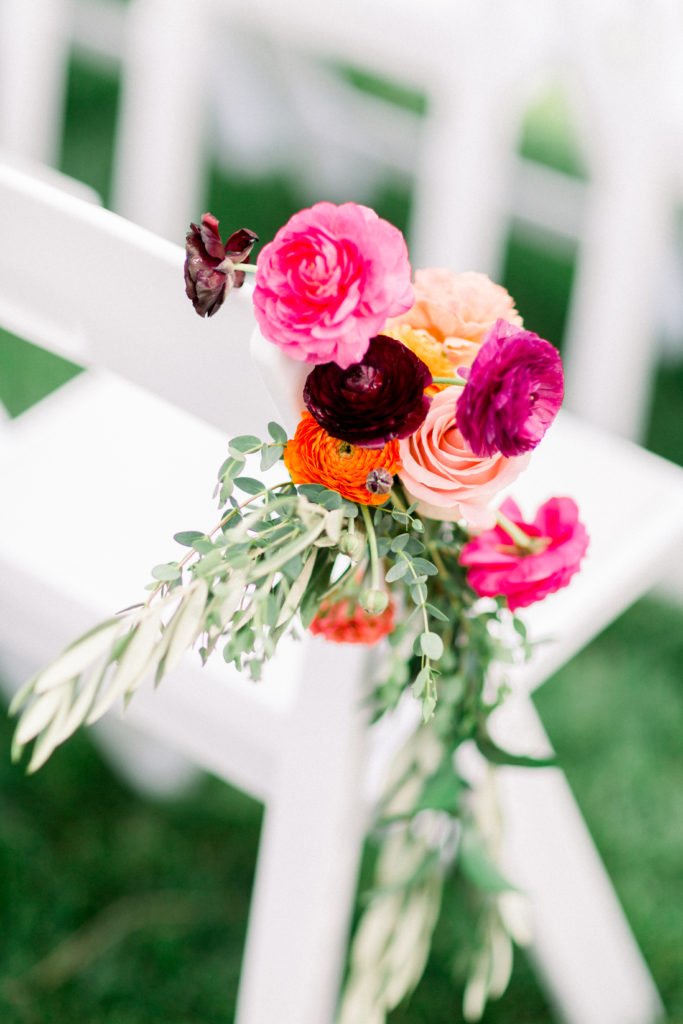 Maravilla Gardens Wedding ceremony, aisle flowers on chairs