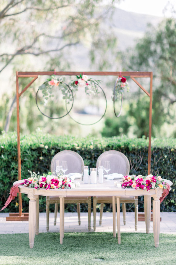 Maravilla Gardens Wedding reception, sweetheart table with flower hoop backdrop