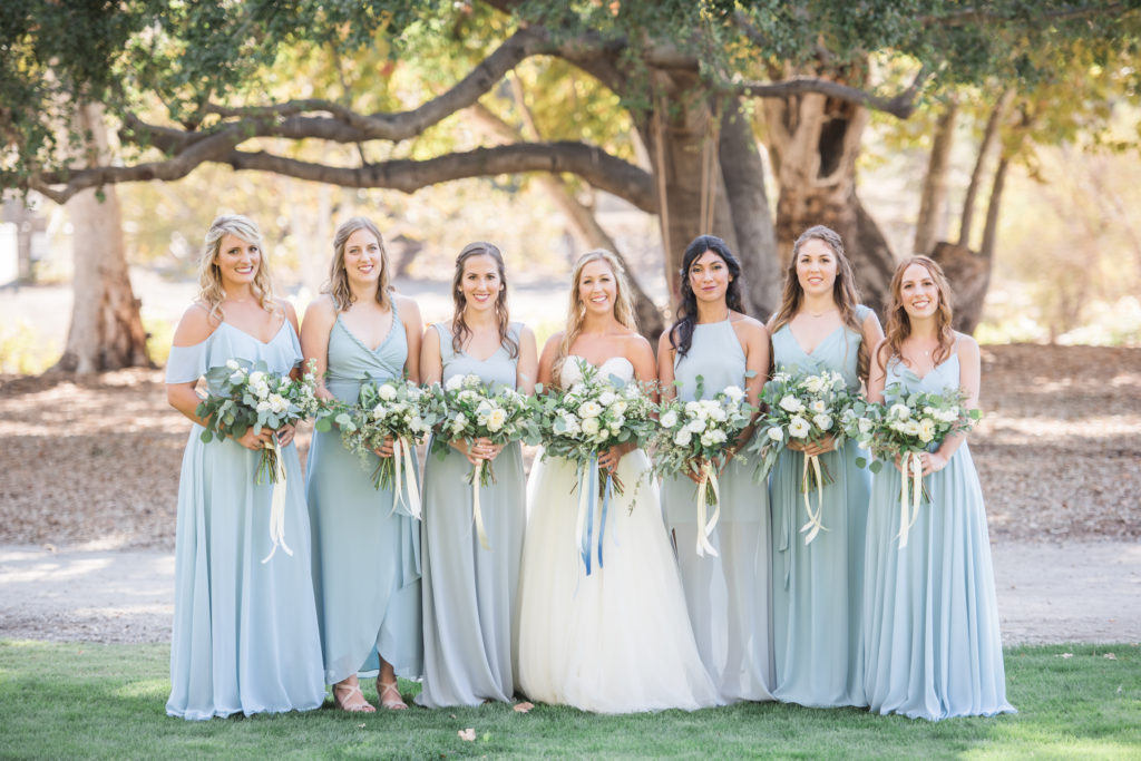 Elegant fall wedding at Triunfo Creek Vineyards, green and white bouquets, bridesmaid in blue dresses