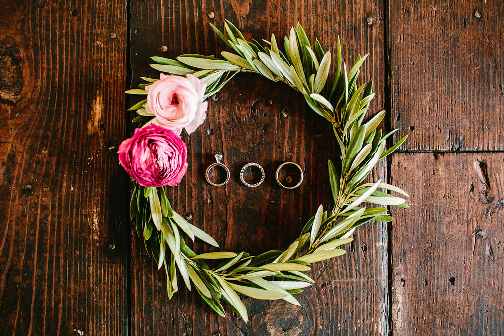 wedding ring with floral wreath detail shot