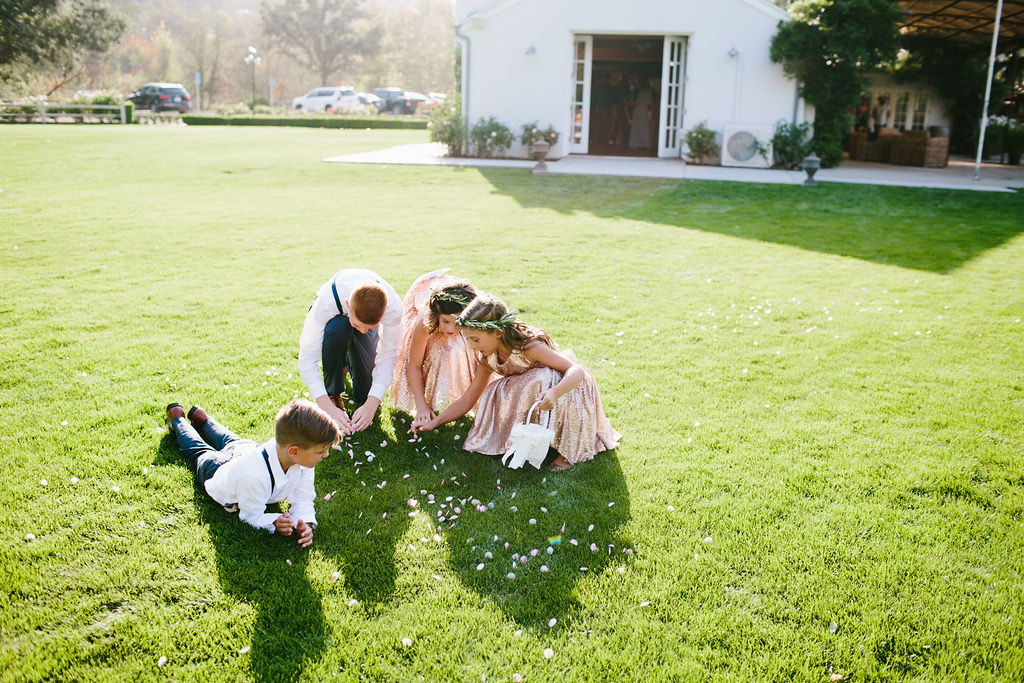 flower girls and ring bearers during wedding ceremony at Triunfo Creek Vineyards