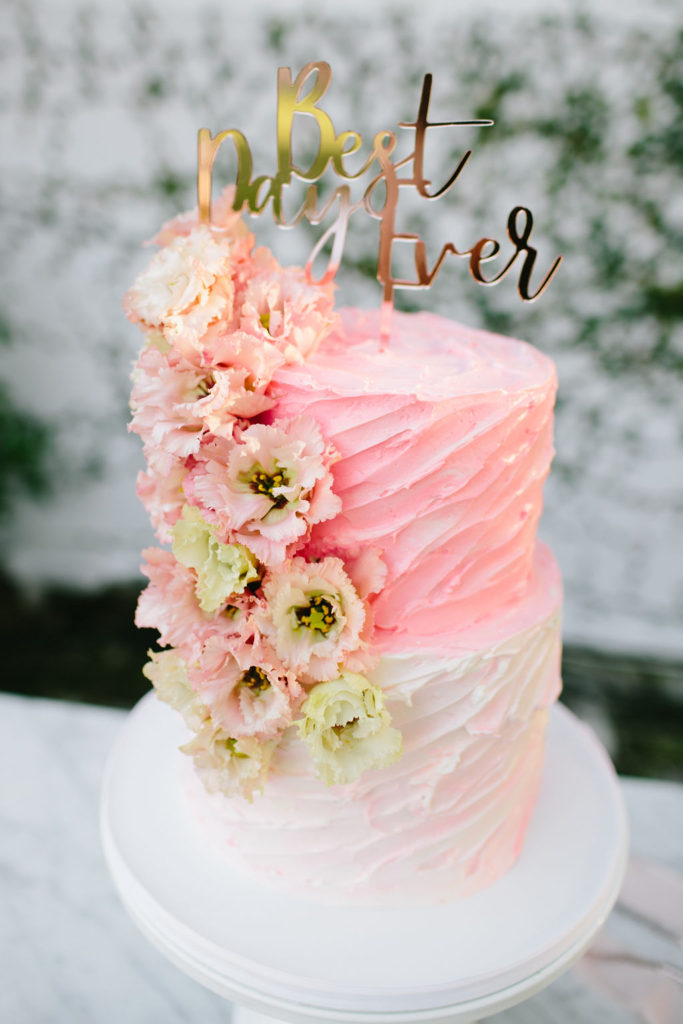 bright pink ombre wedding cake at wedding reception at Triunfo Creek Vineyards