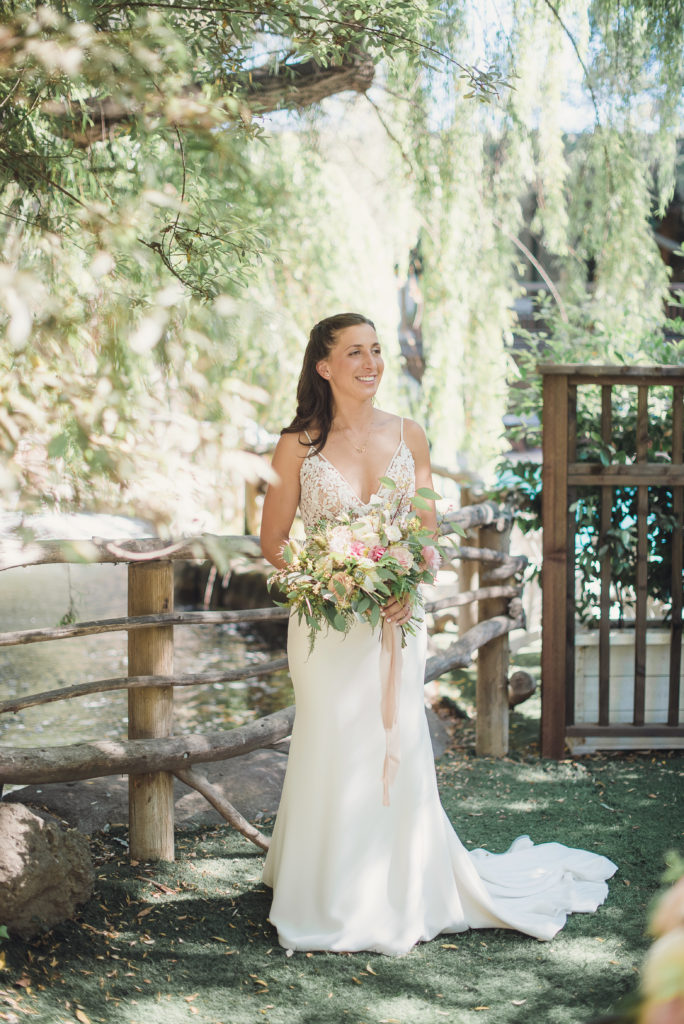 An emotional calamigos ranch wedding, bride with white and pink bridal bouquet