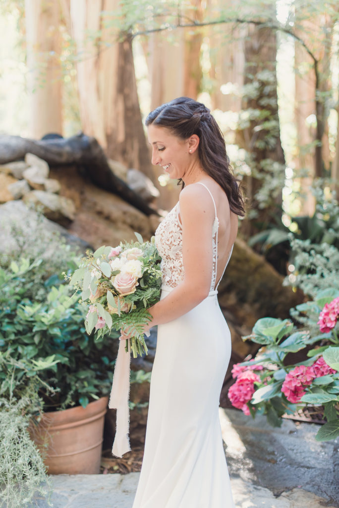 An emotional calamigos ranch wedding, white and pink bridal bouquet, bride with open back wedding dress