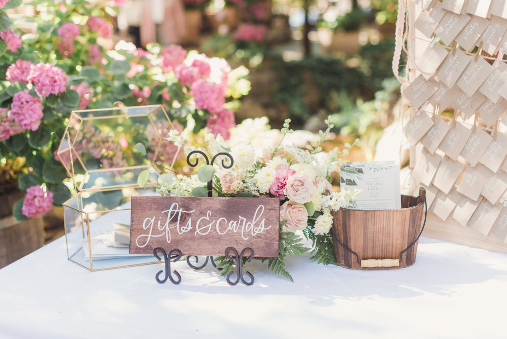 An emotional calamigos ranch wedding, wooden cards and gifts sign