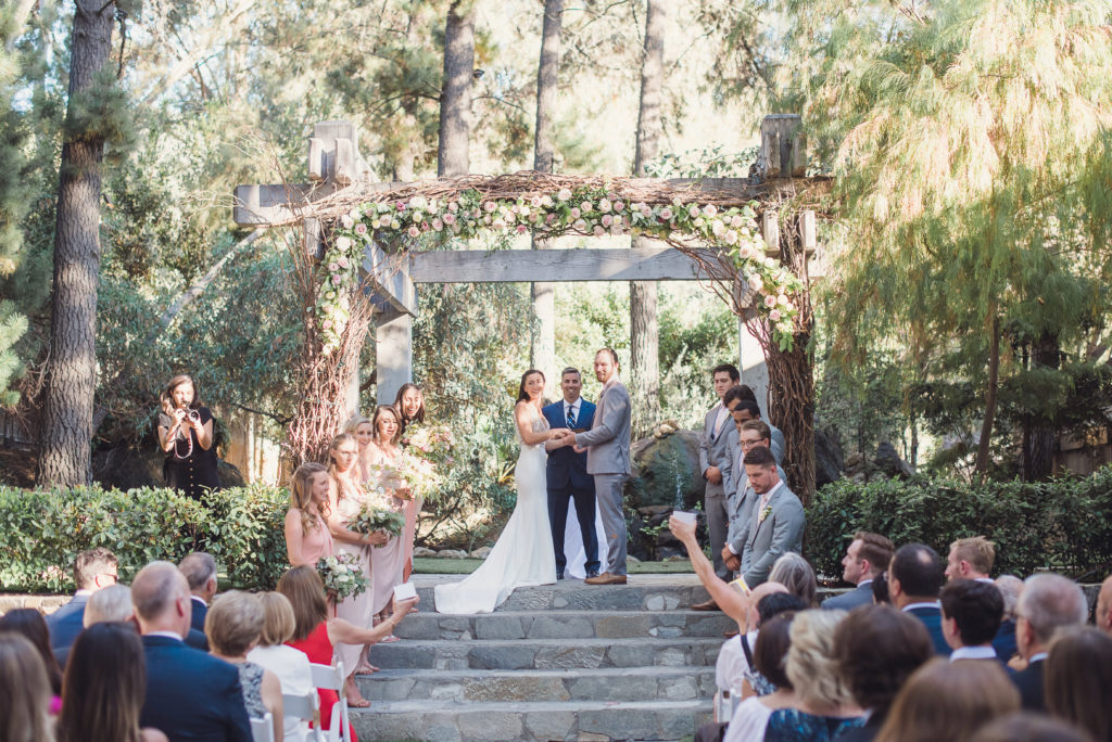 An emotional calamigos ranch wedding, ceremony with butterfly release