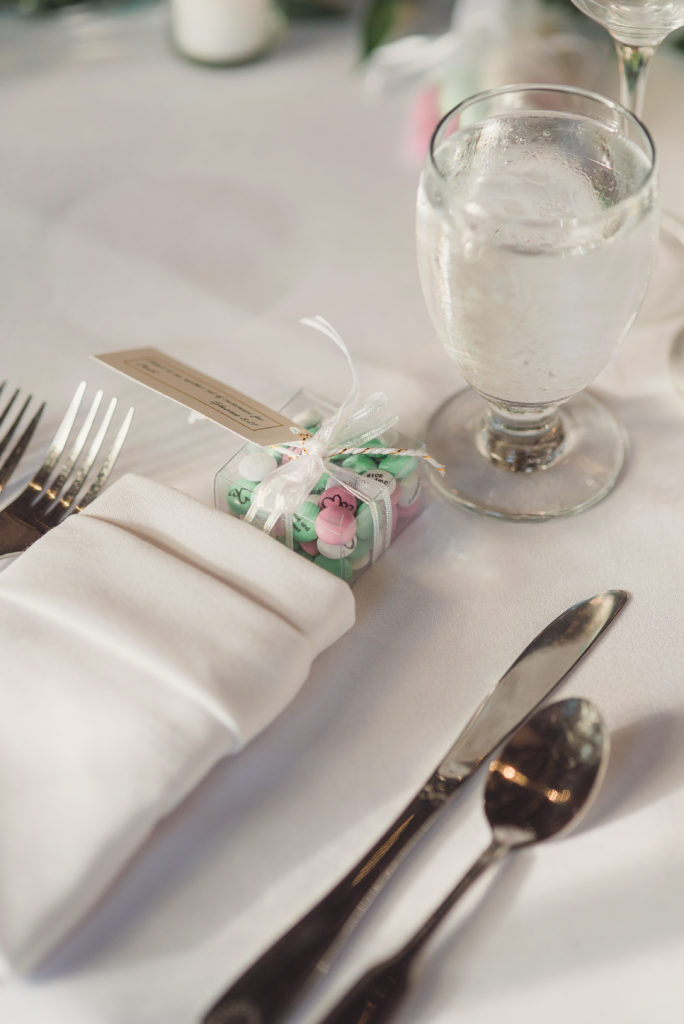 An emotional calamigos ranch wedding, reception tables with candy as guest favors