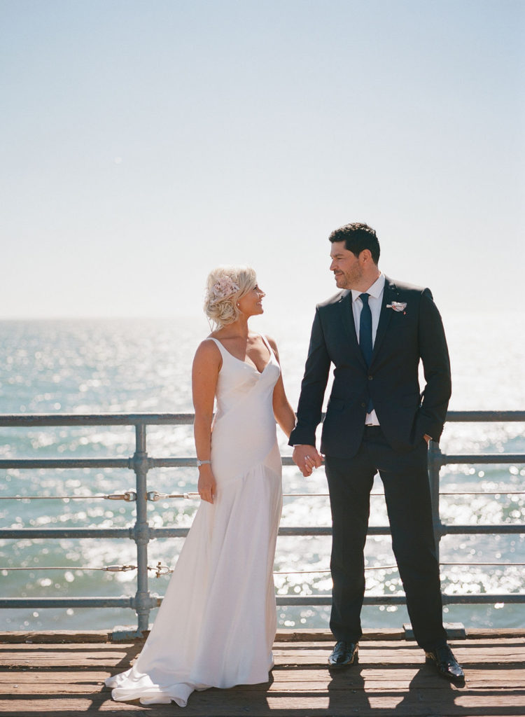 bride and groom sunset portrait shot on Santa Monica pier