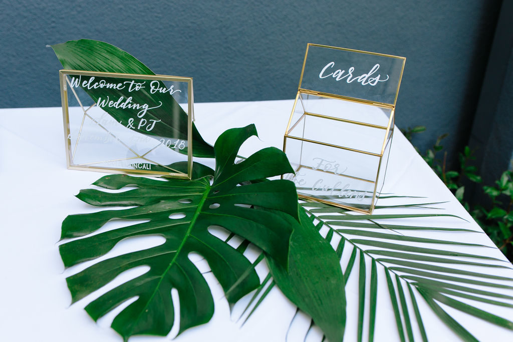A glam and California infused wedding ceremony welcome table at Viceroy Santa Monica