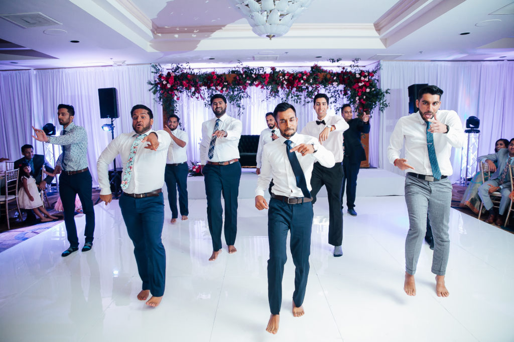 Stunning Indian wedding reception at the DoubleTree Hotel in San Pedro, groomsmen dance