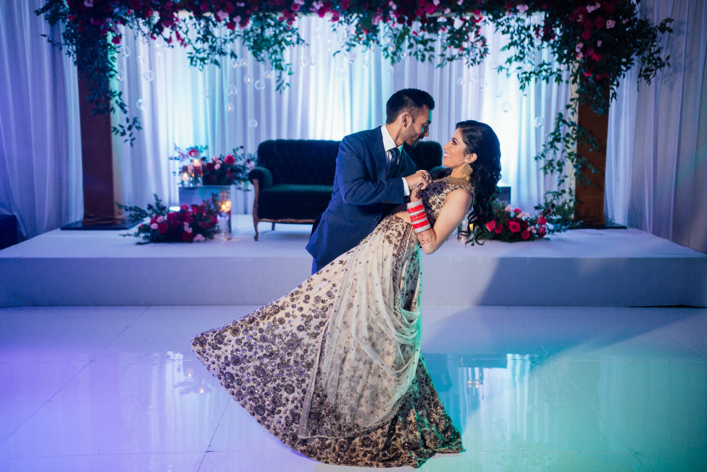Stunning Indian wedding reception at the DoubleTree Hotel in San Pedro, bride and groom first dance