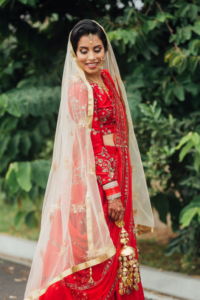 Stunning Indian Wedding in San Pedro, red bridal sari for sikh ceremony