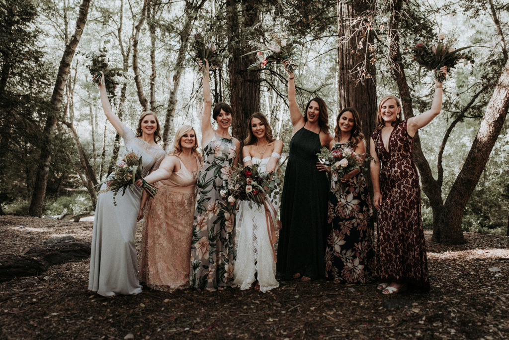 Summer camp themed wedding in Big Bear at Camp Wasegan, bride and bridesmaids in mismatched bridesmaid dresses