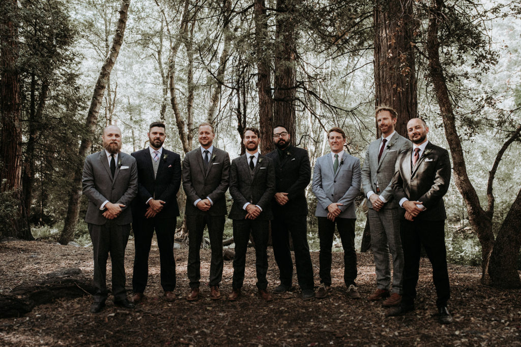 Summer camp themed wedding in Big Bear at Camp Wasegan, groom and groomsmen in mixed tuxedos