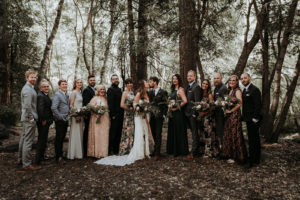 Summer camp themed wedding in Big Bear at Camp Wasegan, wedding party photos in the woods