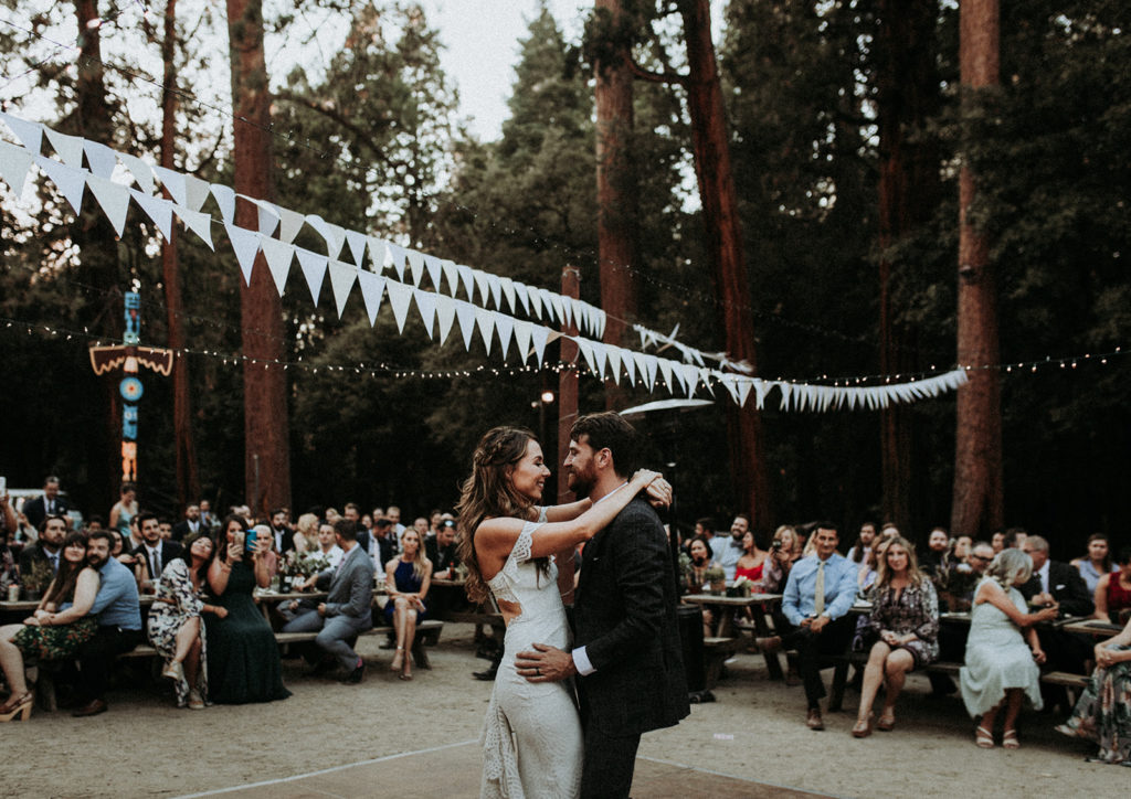 Summer camp themed wedding reception in Big Bear at Camp Wasegan, bride and groom first dance
