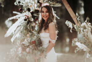 Summer camp themed wedding in Big Bear at Camp Wasegan, bridal portrait shot in the forest