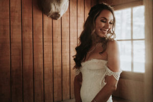 Summer camp themed wedding in Big Bear at Camp Wasegan, bridal hair and make up with loose curls and braided crown