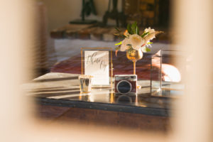 A simple and modern wedding reception at Triunfo Creek Vineyards, vintage polaroid candle
