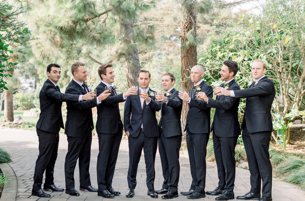 A Romantic Fall Wedding at Maravilla Gardens, groom with groomsmen in dark grey suits