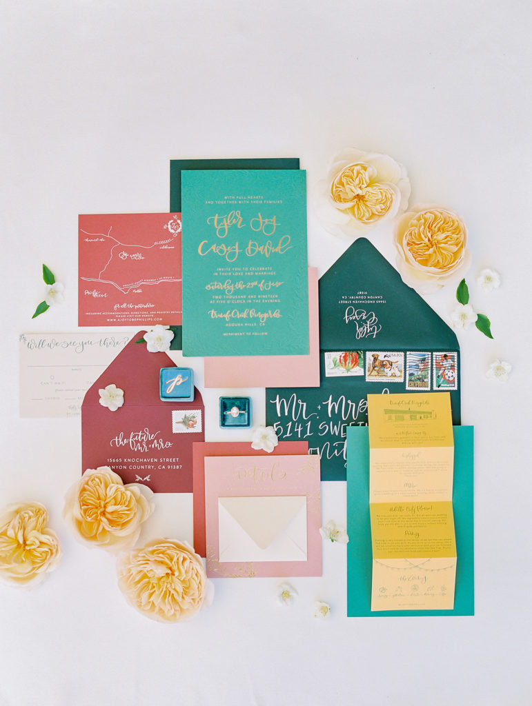 A colorful and vibrant wedding at Triunfo Creek Vineyards, colorful wedding invitation suite