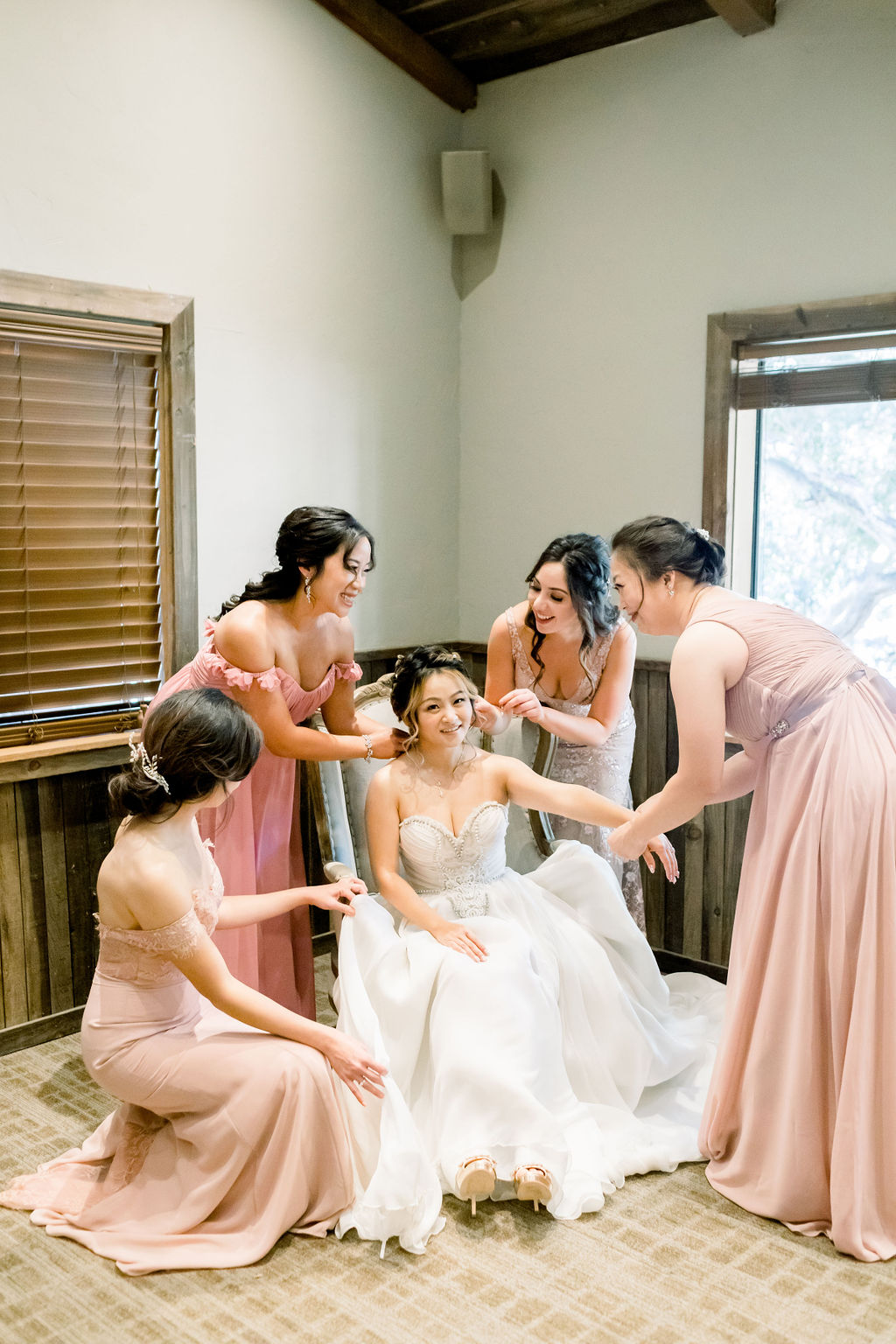 bride gets ready with bridesmaids