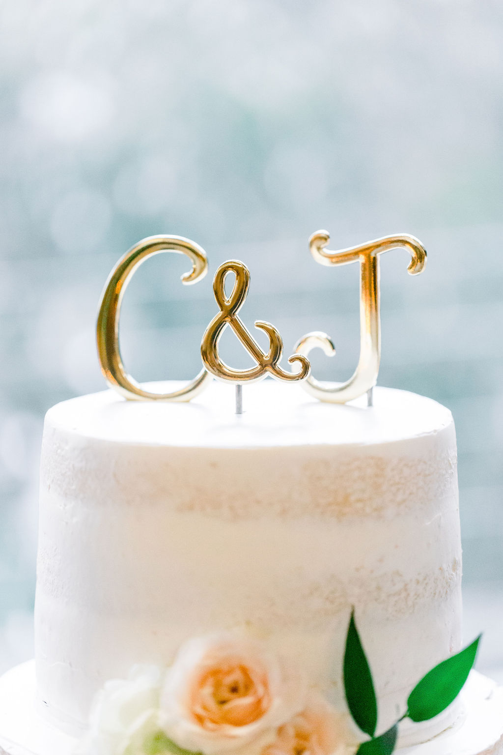 gold initial wedding cake topper