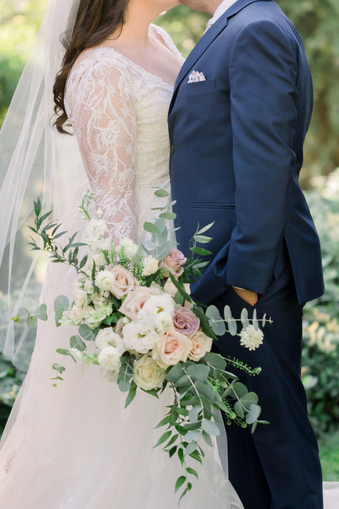 romantic garden wedding bridal bouquet with roses and eucalyptus