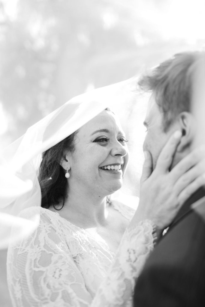 bride and groom portrait shots under veil