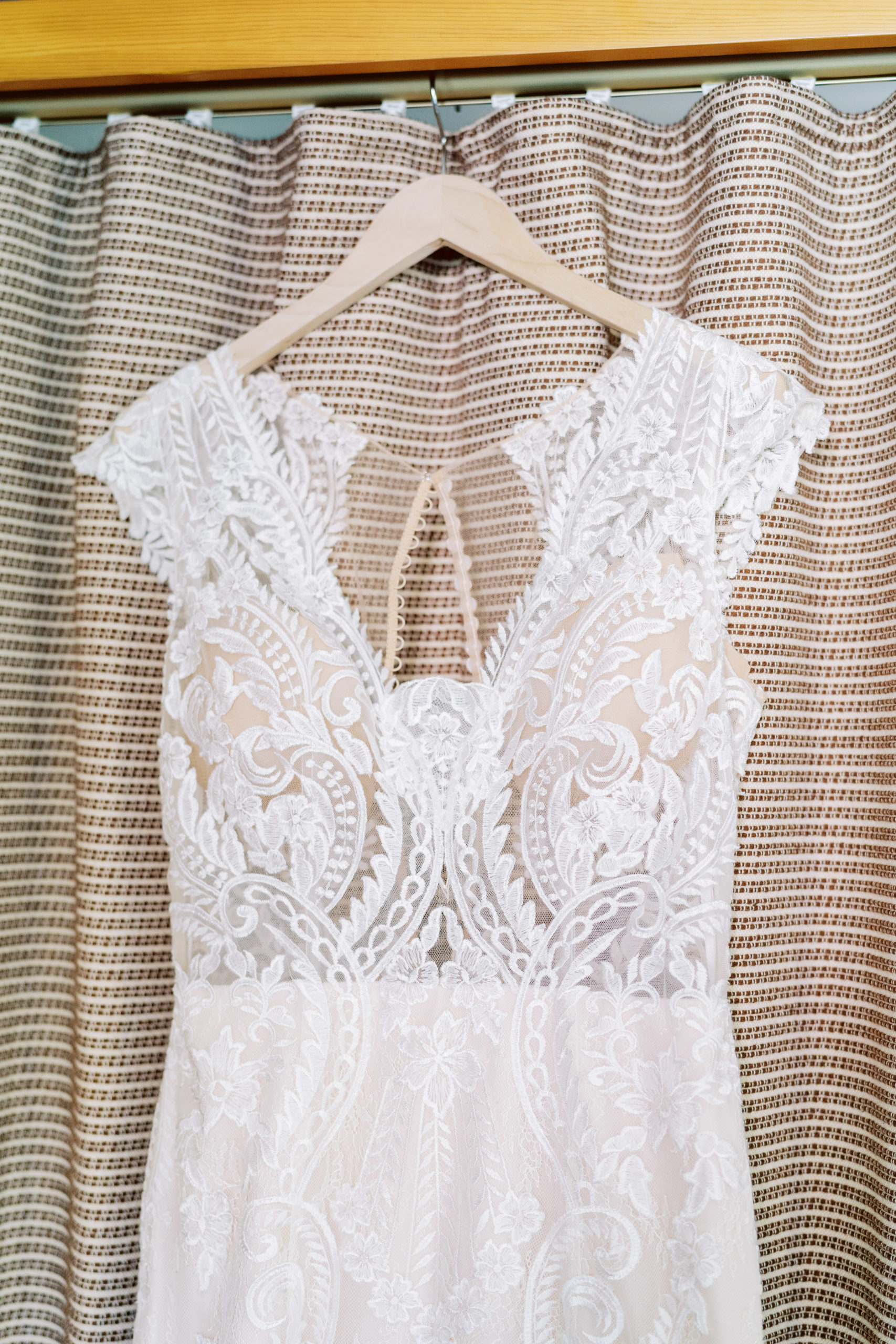 delicate lace detailed wedding dress with cap sleeves