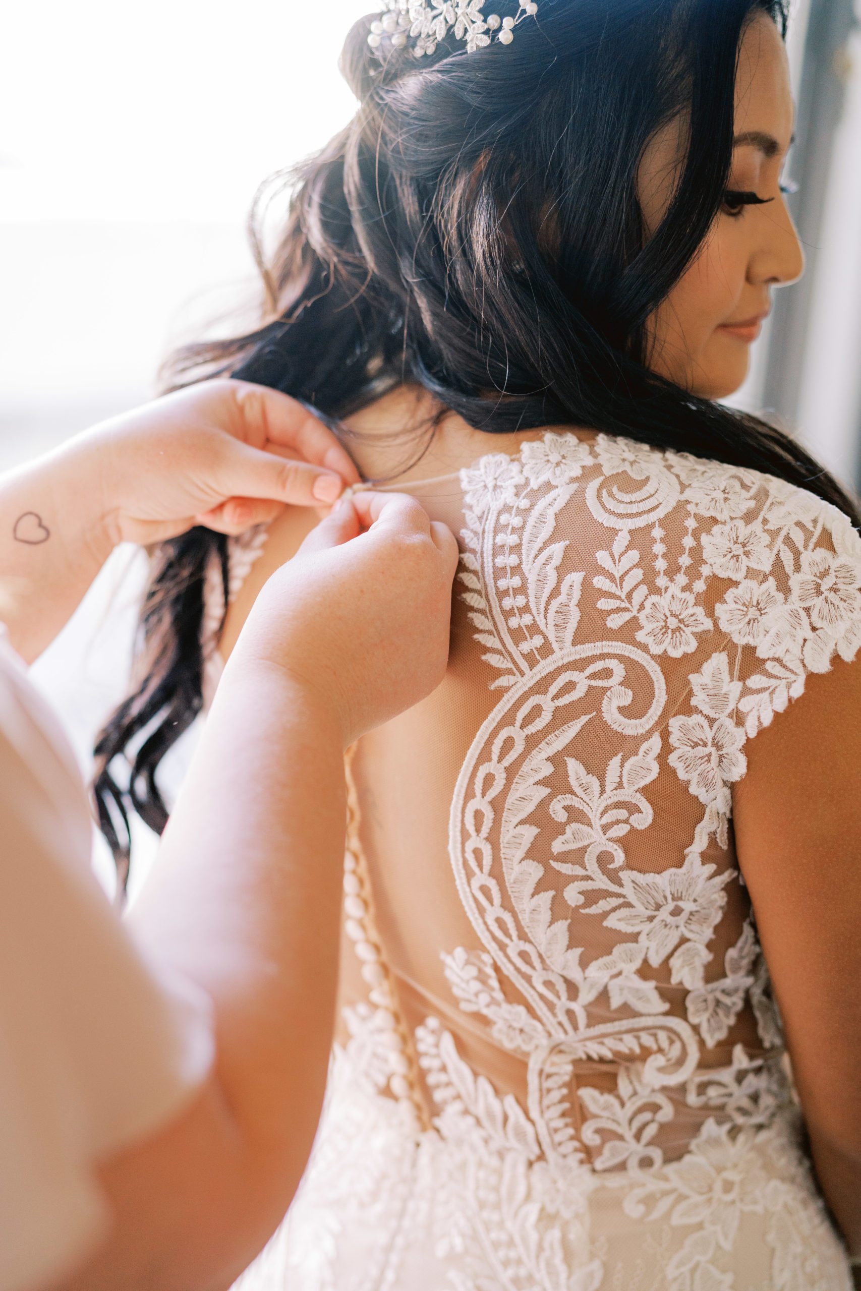 wedding dress with lace back detail and buttons