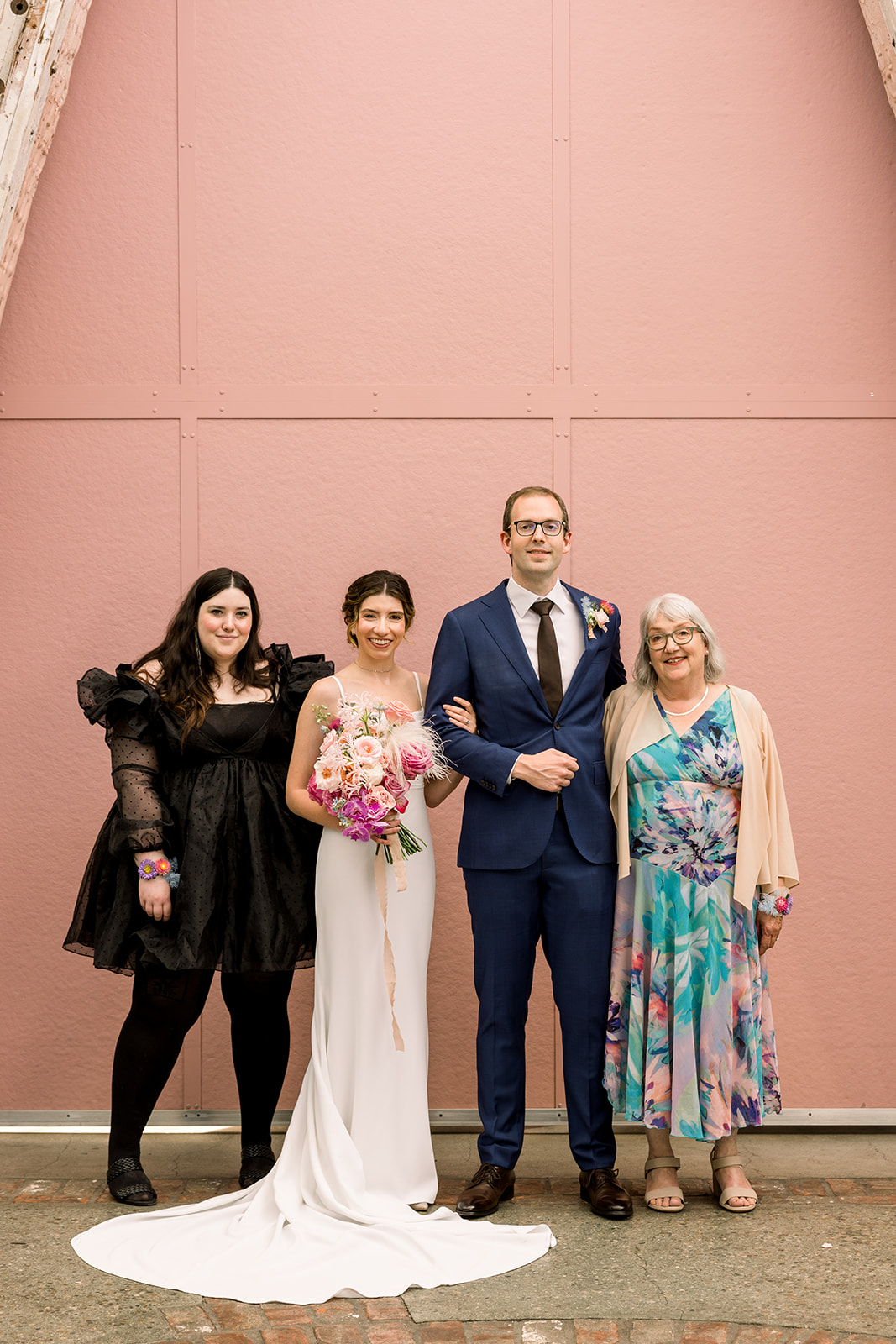 bride and groom stand with family at The Grassroom in DTLA
