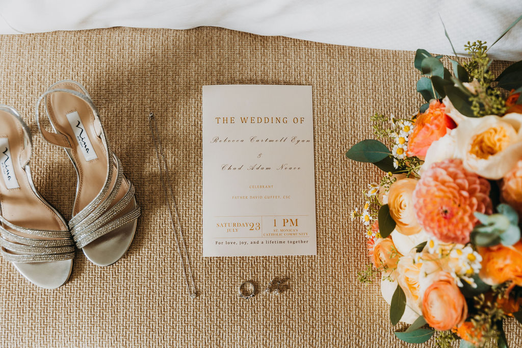 wedding details with gold invitation suite