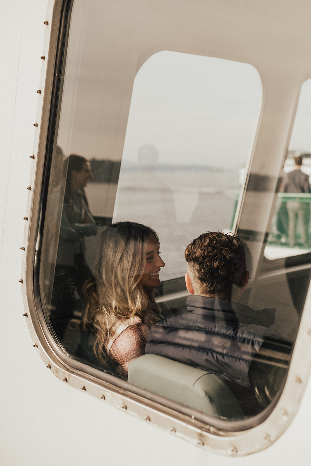  photo of couple on Seattle ferry during fall PNW engagement photo session