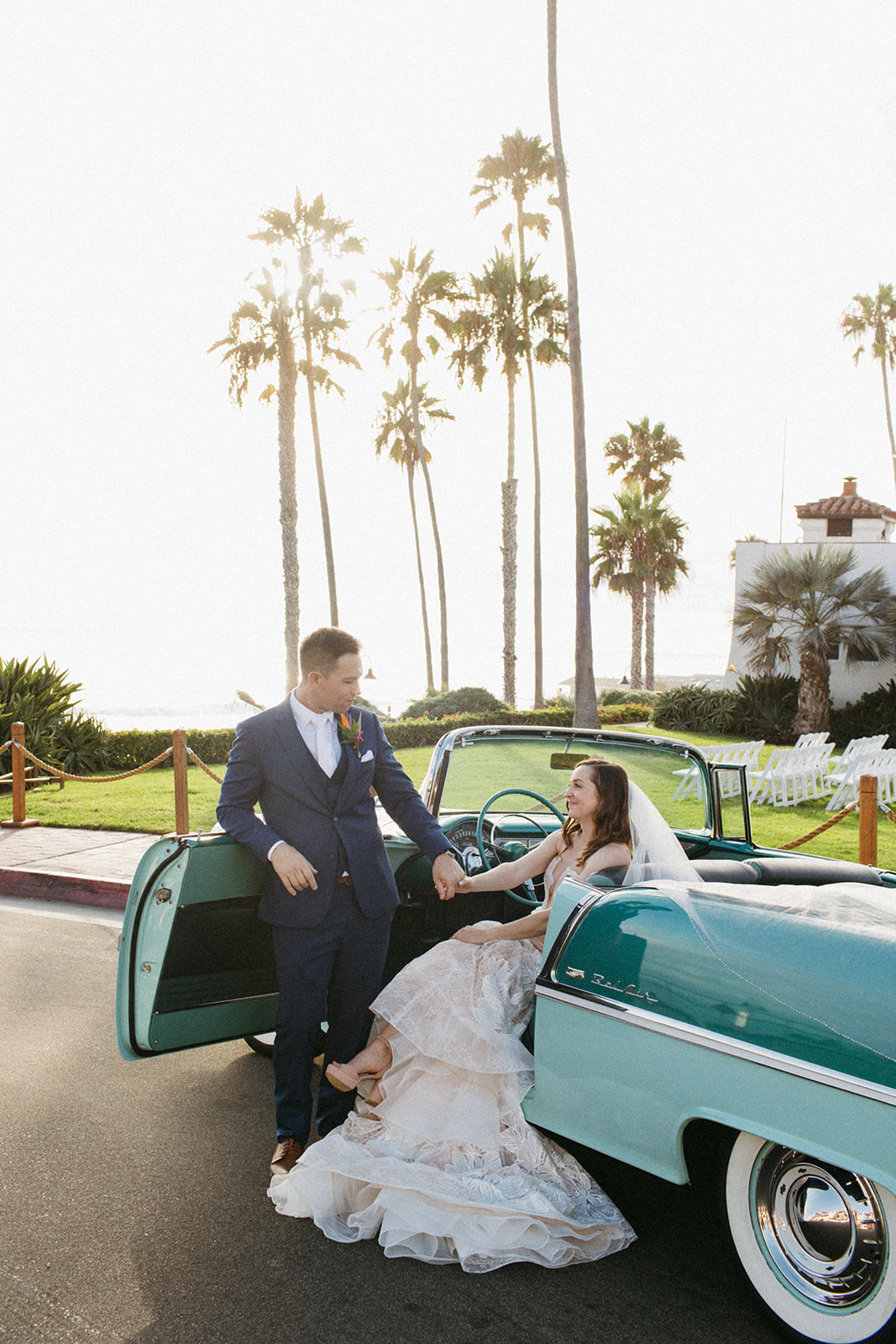 bride and groom portrait shots with vintage blue chevy convertible