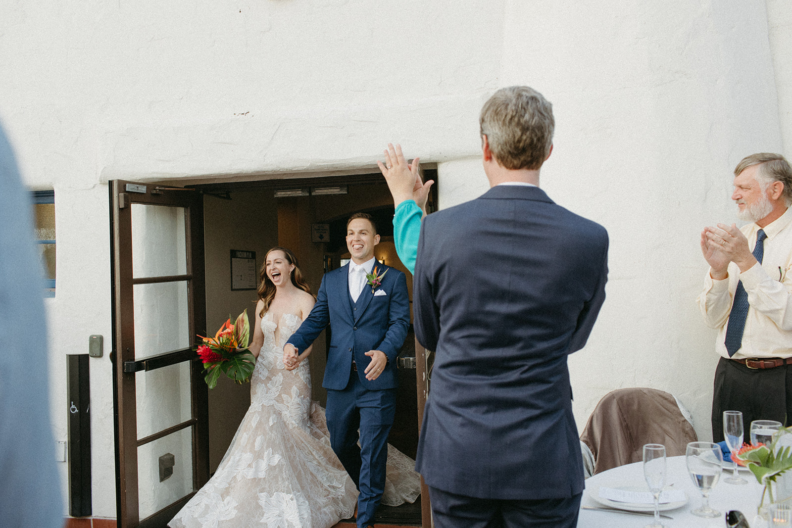 bride and groom grand entrance into wedding reception