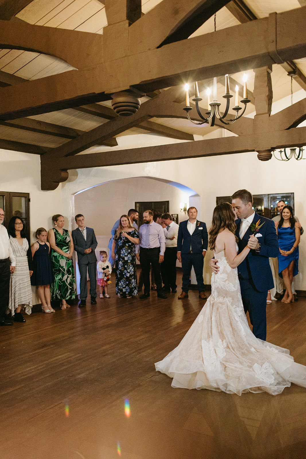 bride and groom first dance during wedding reception 