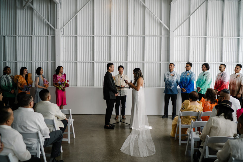 colorful cloud themed wedding ceremony at The Revery