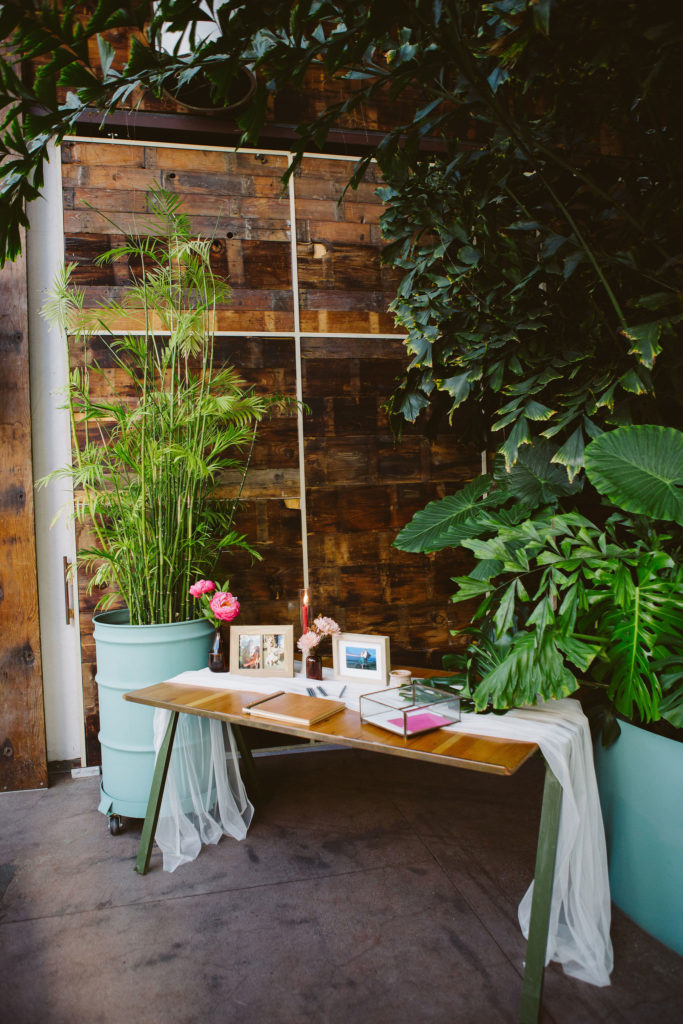 minimal wedding welcome table at Valentine DTLA surrounded by plants