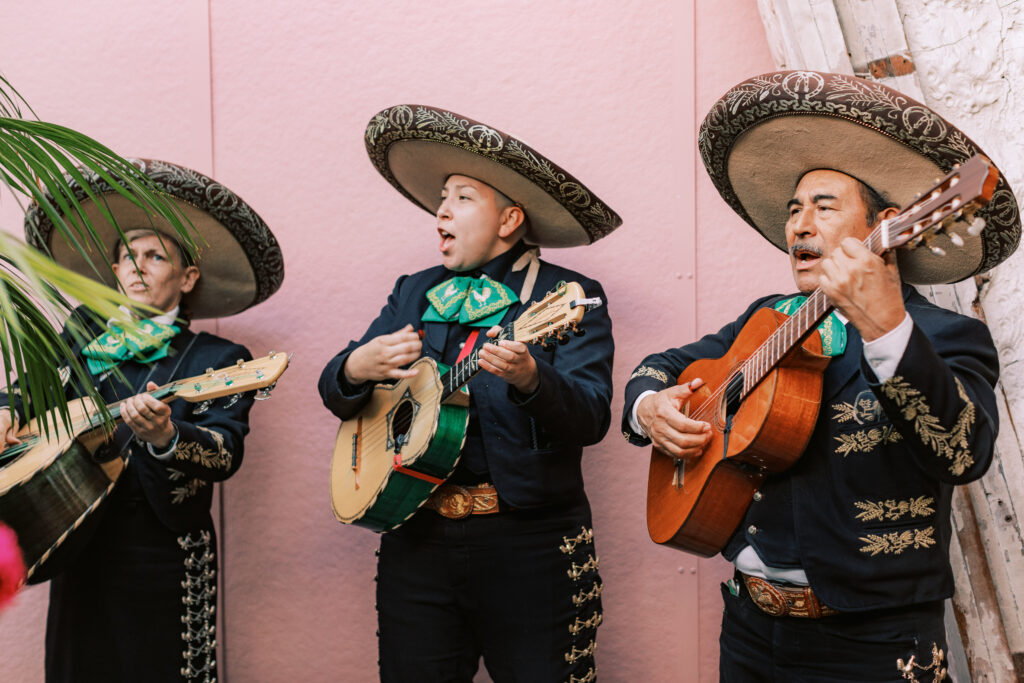 mariachi band playing during cocktail hour for fiesta themed wedding