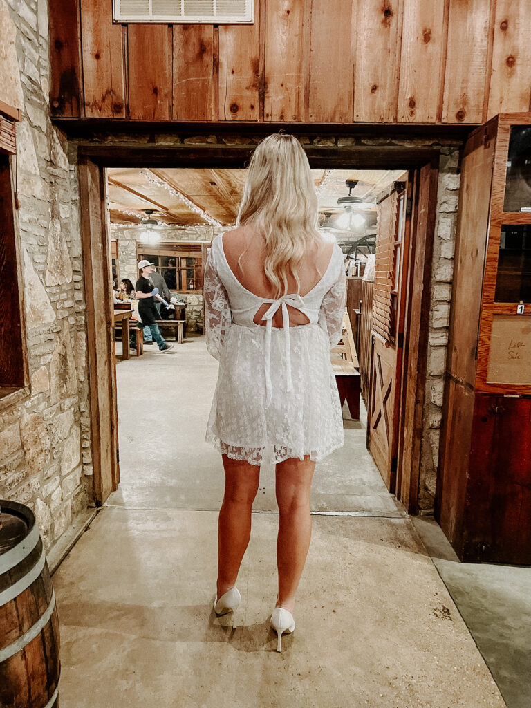 Kari of Feathered Arrow Events wearing mothers altered wedding dress for her rehearsal dinner